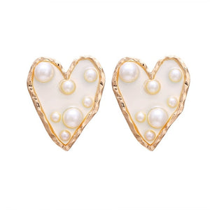 2019 new Korean version of the earrings female models round heart pendant earrings fashion big gold geometric jewelry wholesale